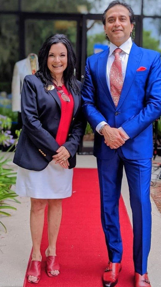 Donna Guzzo, president and executive director of the Cultural Center at Ponte Vedra Beach, stands on the red carpet next to Dr. Arun Gulani during ‘Bespoke on the Boulevard.’
